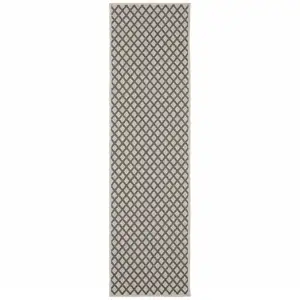 Photo of 2' X 7' Geometric Stain Resistant Indoor Outdoor Area Rug