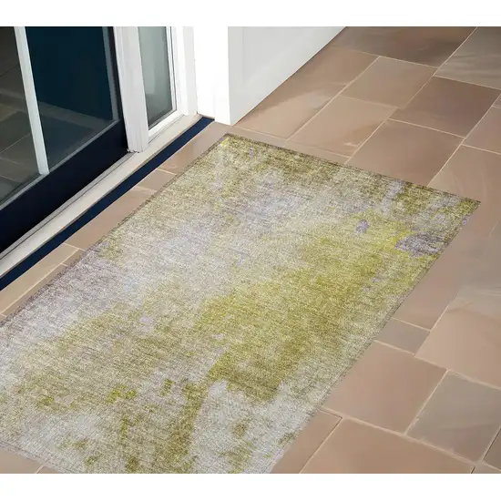 3' X 4' Gold Beige and Purple Abstract Washable Non Skid Indoor Outdoor Area Rug Photo 1