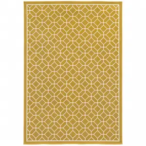 Photo of 9' X 13' Gold Geometric Stain Resistant Indoor Outdoor Area Rug