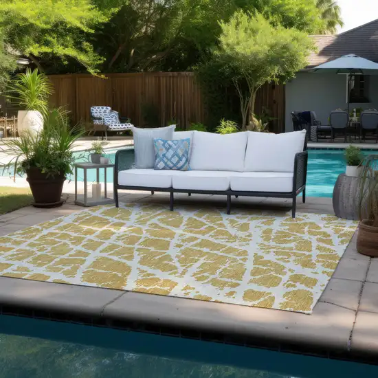 3' X 4' Gold and White Abstract Washable Non Skid Indoor Outdoor Area Rug Photo 8