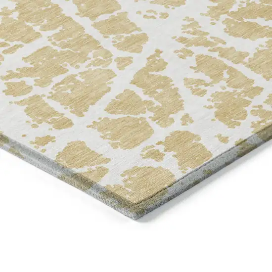 3' X 4' Gold and White Abstract Washable Non Skid Indoor Outdoor Area Rug Photo 6