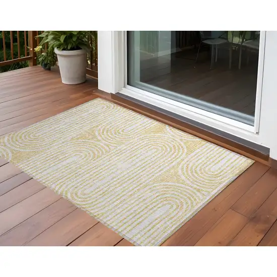 3' X 5' Gold and White Abstract Washable Non Skid Indoor Outdoor Area Rug Photo 1