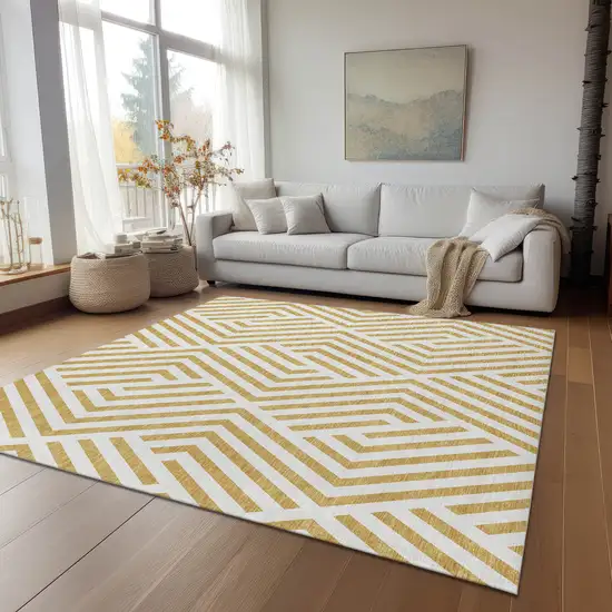 3' X 4' Gold and White Geometric Washable Non Skid Indoor Outdoor Area Rug Photo 8