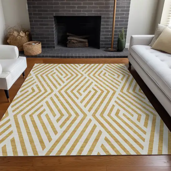 3' X 4' Gold and White Geometric Washable Non Skid Indoor Outdoor Area Rug Photo 7