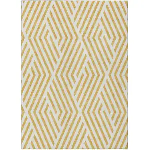 Photo of 3' X 4' Gold and White Geometric Washable Non Skid Indoor Outdoor Area Rug