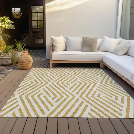 3' X 4' Gold and White Geometric Washable Non Skid Indoor Outdoor Area Rug Photo 9