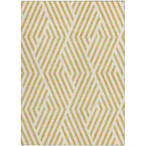 Photo of 3' X 5' Gold and White Geometric Washable Non Skid Indoor Outdoor Area Rug