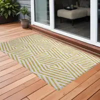 Photo of 3' X 5' Gold and White Geometric Washable Non Skid Indoor Outdoor Area Rug