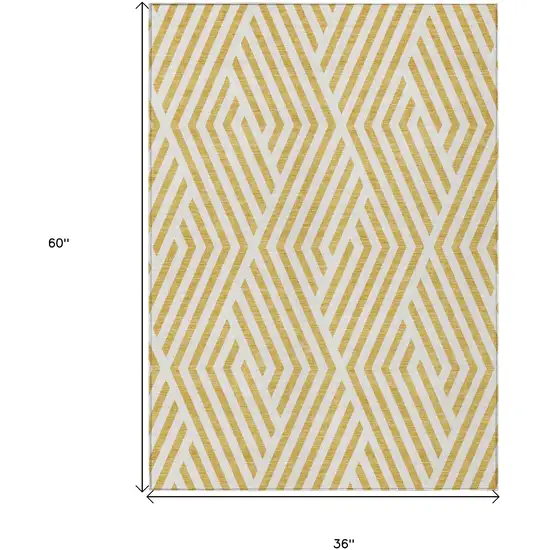 3' X 5' Gold and White Geometric Washable Non Skid Indoor Outdoor Area Rug Photo 3