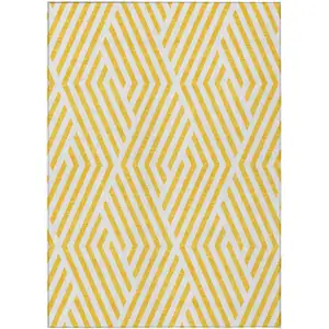 Photo of 3' X 4' Gold and White Geometric Washable Non Skid Indoor Outdoor Area Rug