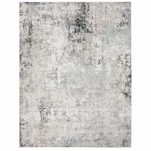 Photo of 8' X 10' Gray Cream And Taupe Abstract Stain Resistant Area Rug