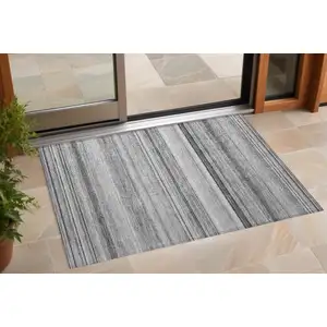 Photo of 3' X 5' Gray Striped Washable Non Skid Indoor Outdoor Area Rug