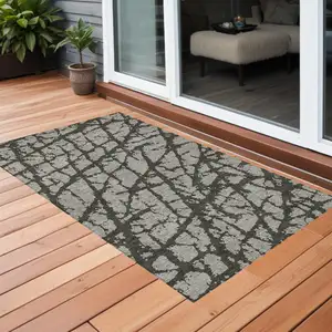 Photo of 3' X 5' Gray and Black Abstract Washable Non Skid Indoor Outdoor Area Rug