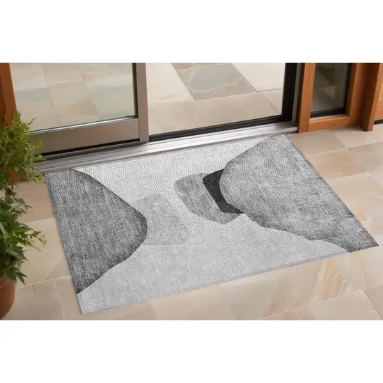 3' X 5' Gray and Black Abstract Washable Non Skid Indoor Outdoor Area Rug Photo 1