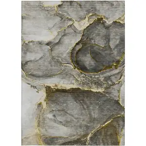 Photo of 3' X 5' Gray and Gold Abstract Washable Non Skid Indoor Outdoor Area Rug