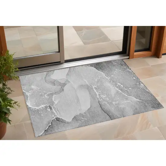 3' X 5' Gray and Ivory Abstract Washable Non Skid Indoor Outdoor Area Rug Photo 1