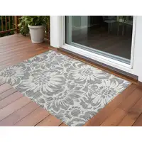 Photo of 3' X 5' Gray and Ivory Floral Washable Non Skid Indoor Outdoor Area Rug