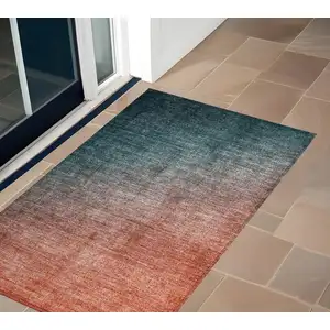 Photo of 3' X 5' Gray and Red Orange Ombre Washable Non Skid Indoor Outdoor Area Rug