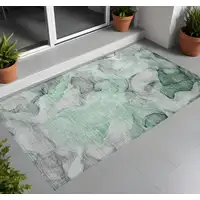 Photo of 3' X 4' Green Abstract Washable Non Skid Indoor Outdoor Area Rug