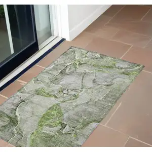 Photo of 3' X 4' Green Abstract Washable Non Skid Indoor Outdoor Area Rug