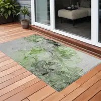 Photo of 3' X 4' Green Abstract Washable Non Skid Indoor Outdoor Area Rug