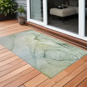 Photo of 3' X 5' Green Abstract Washable Non Skid Indoor Outdoor Area Rug