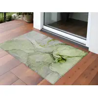 Photo of 3' X 5' Green Abstract Washable Non Skid Indoor Outdoor Area Rug