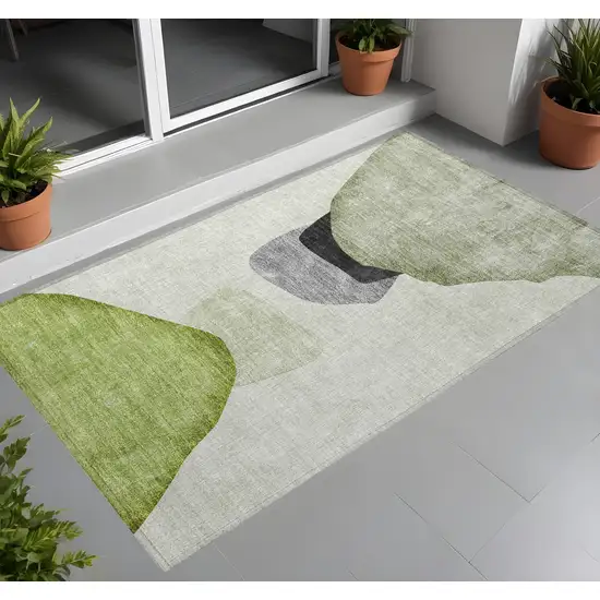 3' X 4' Green Black and Gray Abstract Washable Non Skid Indoor Outdoor Area Rug Photo 1