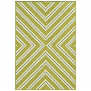 Photo of 9' X 13' Green Geometric Stain Resistant Indoor Outdoor Area Rug