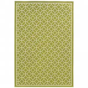 Photo of 9' X 13' Green Geometric Stain Resistant Indoor Outdoor Area Rug