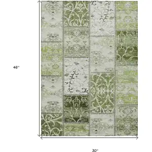 Photo of 3' X 4' Green Patchwork Washable Non Skid Indoor Outdoor Area Rug