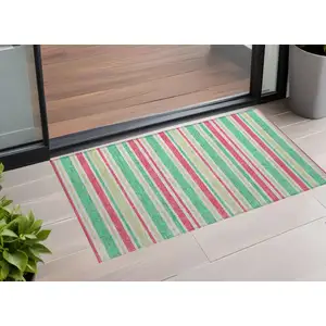 Photo of 3' X 4' Green Striped Washable Non Skid Indoor Outdoor Area Rug