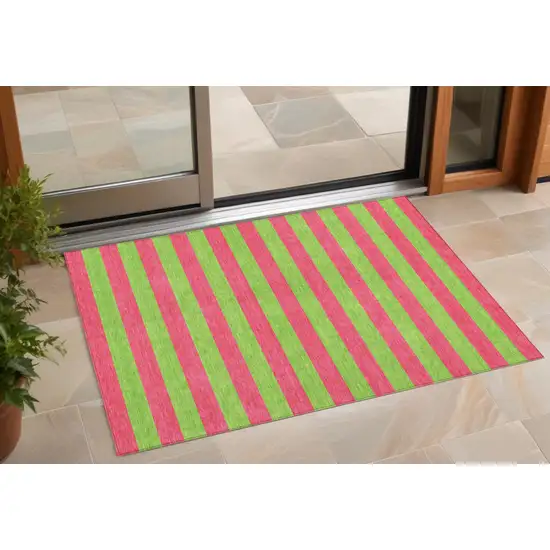 3' X 4' Green and Red Striped Washable Non Skid Indoor Outdoor Area Rug Photo 1