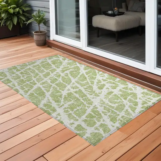 3' X 4' Green and White Abstract Washable Non Skid Indoor Outdoor Area Rug Photo 1