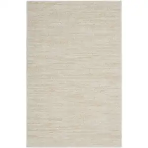 Photo of 2' X 4' Ivory And Beige Non Skid Indoor Outdoor Runner Rug