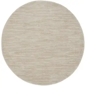 Photo of 4' X 4' Ivory And Beige Round Non Skid Indoor Outdoor Area Rug