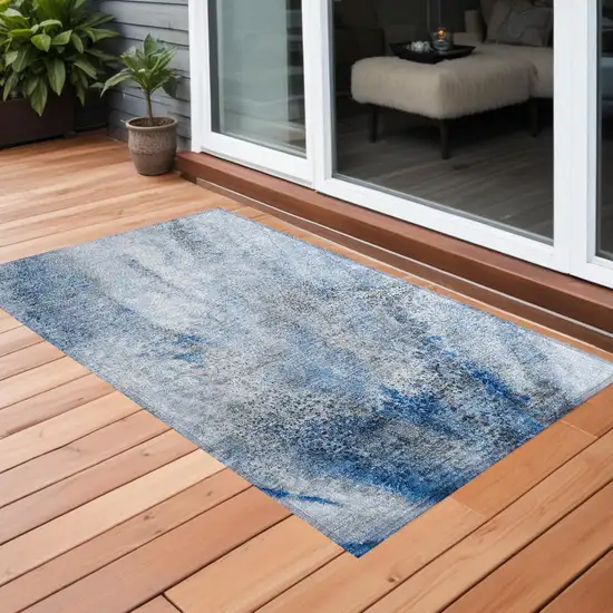 3' X 4' Ivory Blue and Gray Abstract Washable Non Skid Indoor Outdoor Area Rug Photo 1