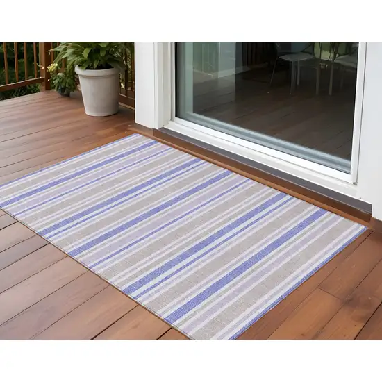 3' X 4' Ivory Blue and Gray Striped Washable Non Skid Indoor Outdoor Area Rug Photo 1