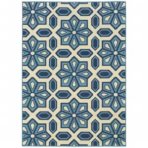 Photo of 6' X 9' Ivory Geometric Stain Resistant Indoor Outdoor Area Rug