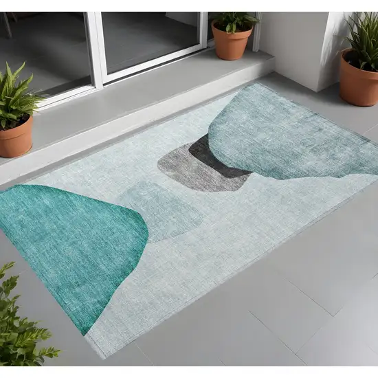 3' X 4' Ivory Teal and Gray Abstract Washable Non Skid Indoor Outdoor Area Rug Photo 1