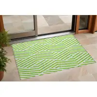 Photo of 3' X 4' Lime Green and White Geometric Washable Non Skid Indoor Outdoor Area Rug