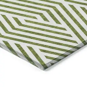 Photo of 3' X 5' Lime Green and White Geometric Washable Non Skid Indoor Outdoor Area Rug