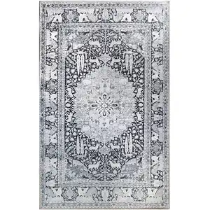 Photo of 7' X 9' Medallion Stain Resistant Area Rug