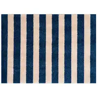 Photo of 2' X 3' Navy And Sand Striped Tufted Washable Non Skid Area Rug