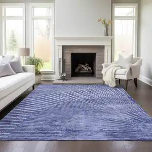 Photo of 3' X 5' Navy Blue Abstract Washable Non Skid Indoor Outdoor Area Rug