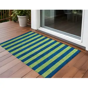 Photo of 3' X 4' Navy Blue Striped Washable Non Skid Indoor Outdoor Area Rug