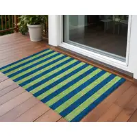 Photo of 3' X 5' Navy Blue Striped Washable Non Skid Indoor Outdoor Area Rug