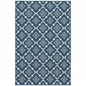 Photo of 6' X 9' Navy Floral Stain Resistant Indoor Outdoor Area Rug