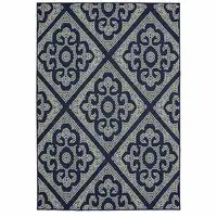 Photo of 6' X 9' Navy Geometric Stain Resistant Indoor Outdoor Area Rug