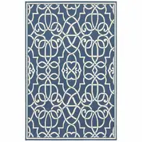 Photo of 6' X 9' Navy Geometric Stain Resistant Indoor Outdoor Area Rug